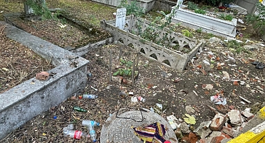 Mezarlığı çöplüğe çevirdiler