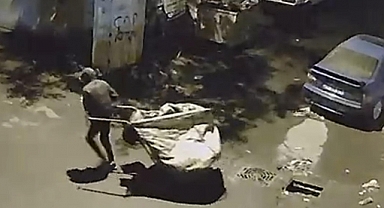 Zıplayarak yerinden çıkarttığı rögar kapağını çaldı; o anlar kamerada