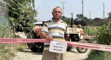 Tapulu arazisindeki yola 'özel mülk' yazısı asıp, ulaşıma kapattı