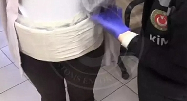 Beline sarılı bezde 40 kaçak cep telefonuyla yakalandı